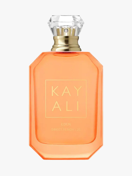 Kayali Sweet Peach in branded component on a light gray background